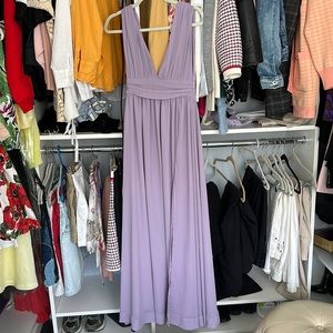Prom or wedding guest dress in lavender color.
